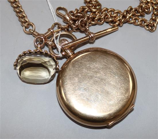 A 9ct gold Waltham hunter pocket watch and a 9ct fob chain with spinning fob.